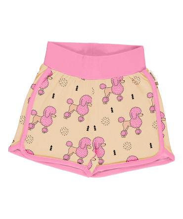 Pantalón corto, hecho en algodón orgánico, con divertido estampado de caniches sobre fondo rosa y vivos a contraste en fucsia. Es una prenda unisex.