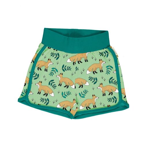 Pantalón corto, hecho en algodón orgánico, con divertido estampado de zorros sobre fondo verde y vivos a contraste en turquesa. Es una prenda unisex.
